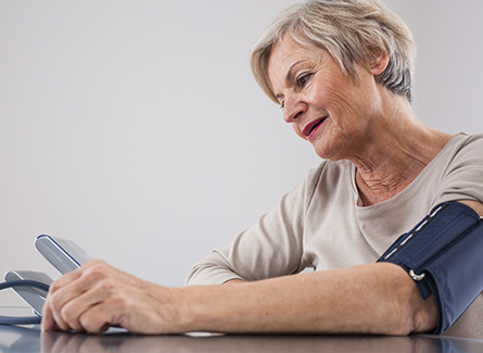 Woman checking blood pressure