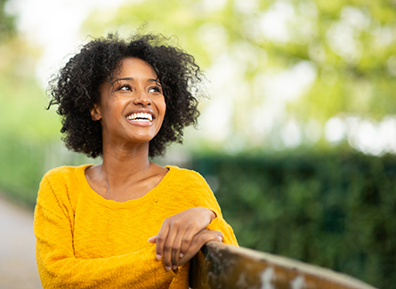 Happy woman in park